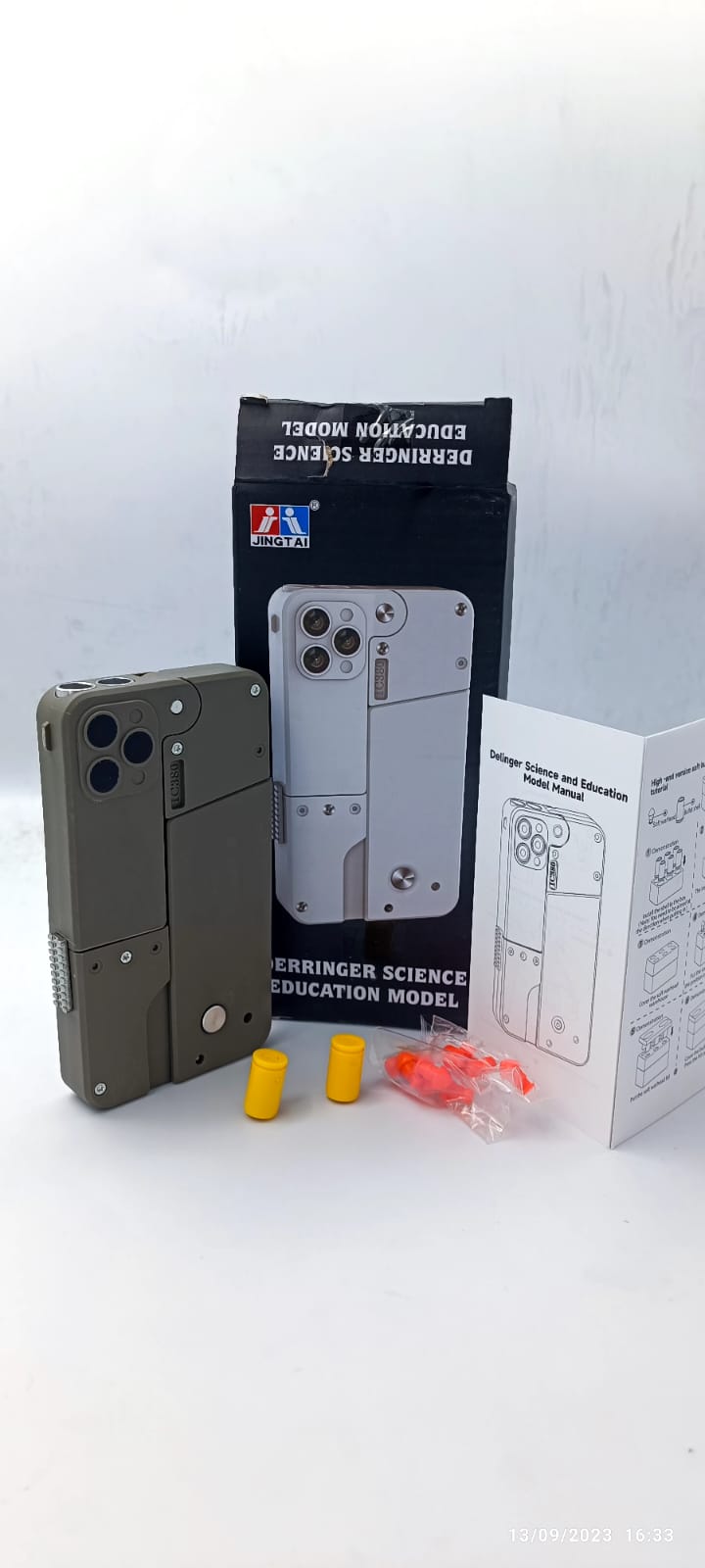 Shell Ejecting Folding Phone Bullet Toy 29.00